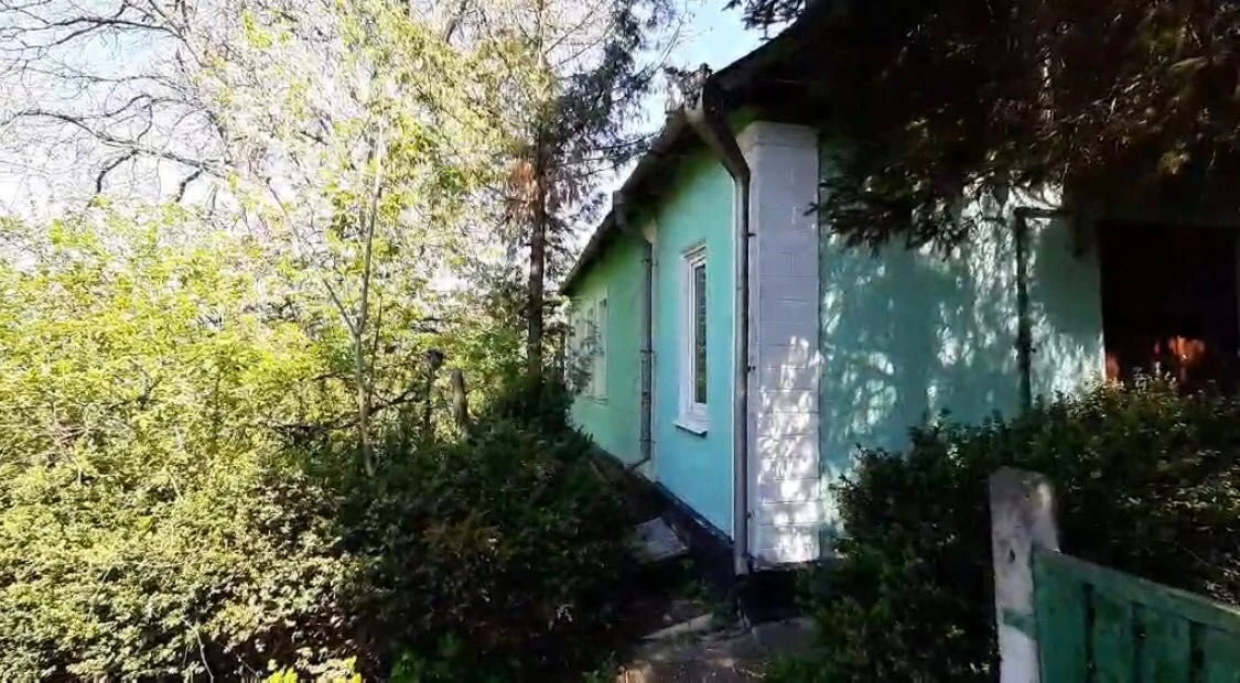 Ексклюзивна земельна ділянка з будинком у центрі міста