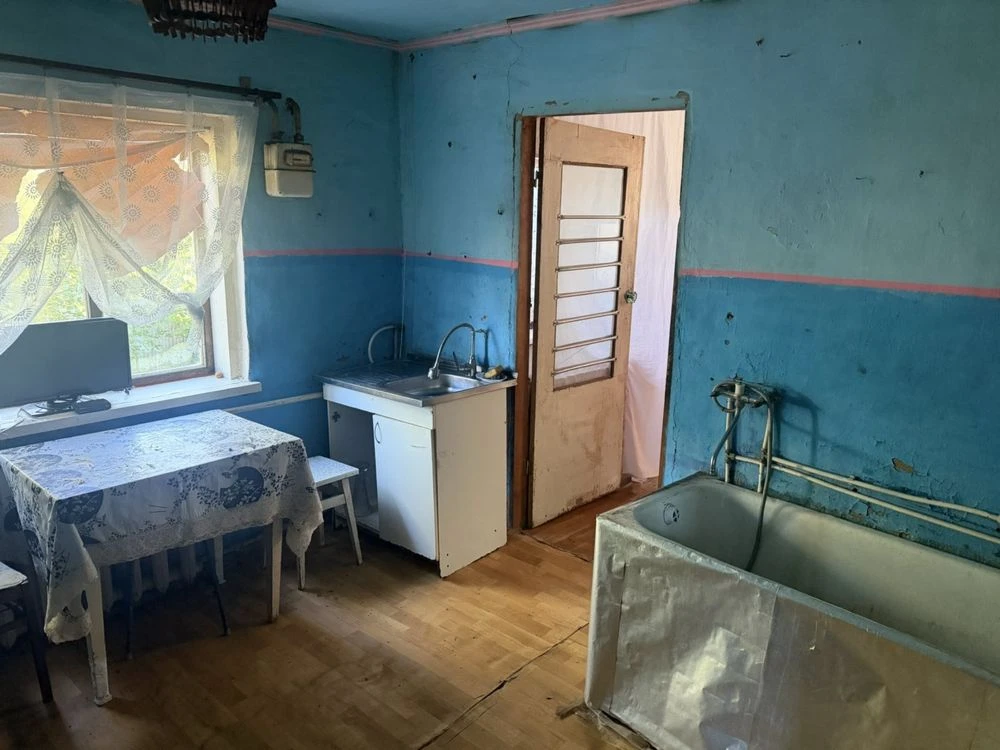 Продаж будинку місто Канів