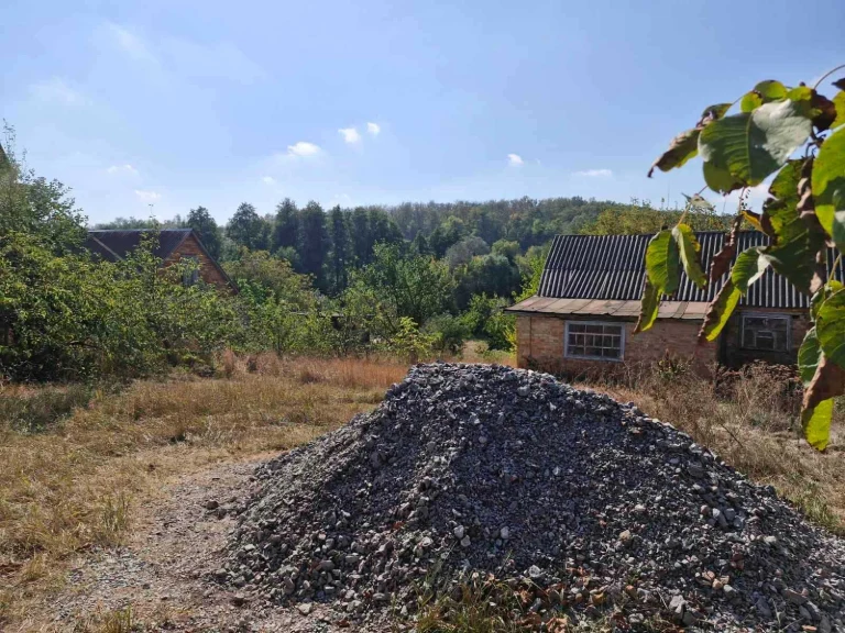 Продам будинок /32 сотки землі/ в Корсунь-Шевченківському