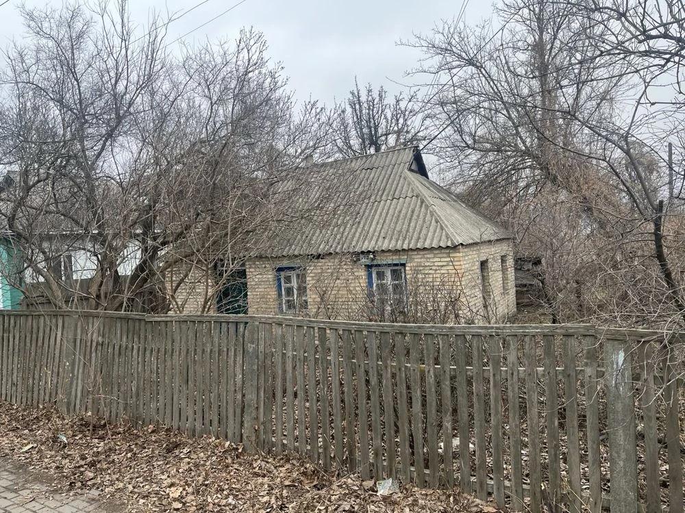 Земельна ділянка з будинком