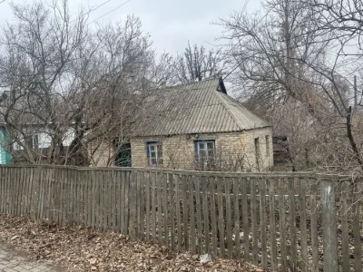 Земельна ділянка з будинком