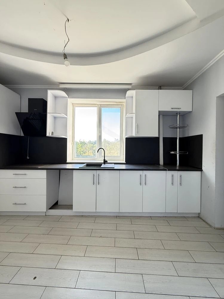 Будинок у Чигирині — 124,4 м², 4 кімнати, 8 соток, гараж