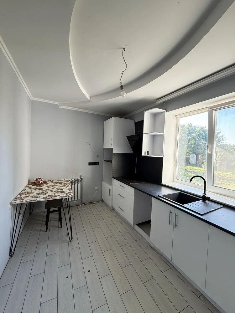 Будинок у Чигирині — 124,4 м², 4 кімнати, 8 соток, гараж