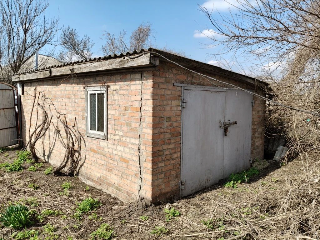 Продаж 0/5 будинку з окремим двором