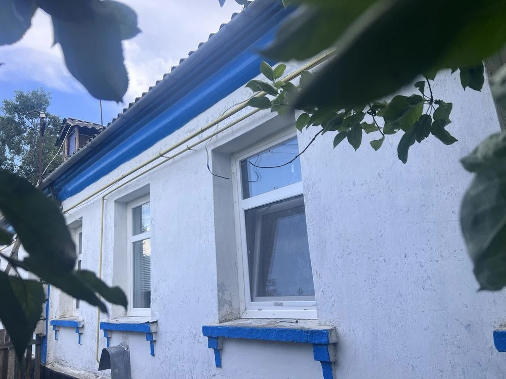 Одноповерхова квартира з земельною ділянкою