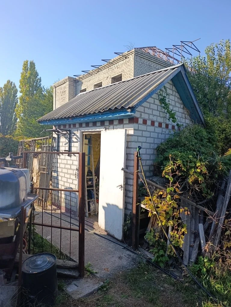 Продам 1/2 дома на Керченской