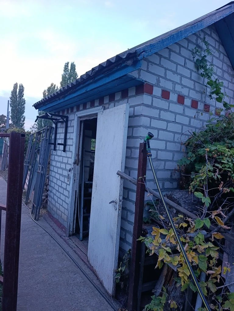 Продам 1/2 дома на Керченской