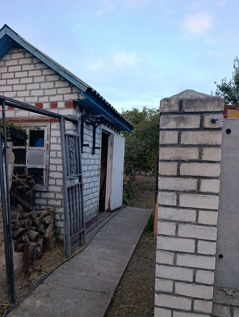 Продам 1/2 дома на Керченской