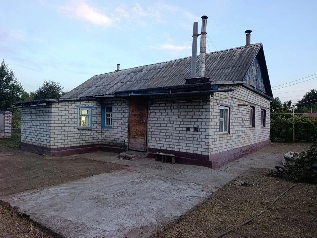 Продам 1/2 дома на Керченской