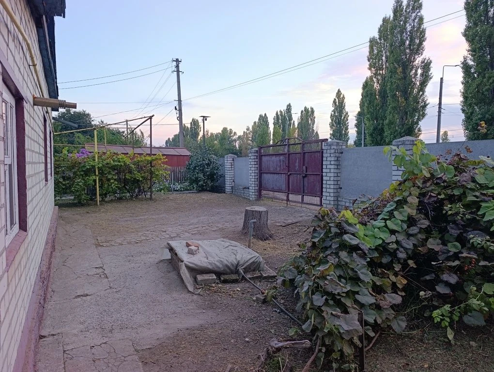 Продам 1/2 дома на Керченской