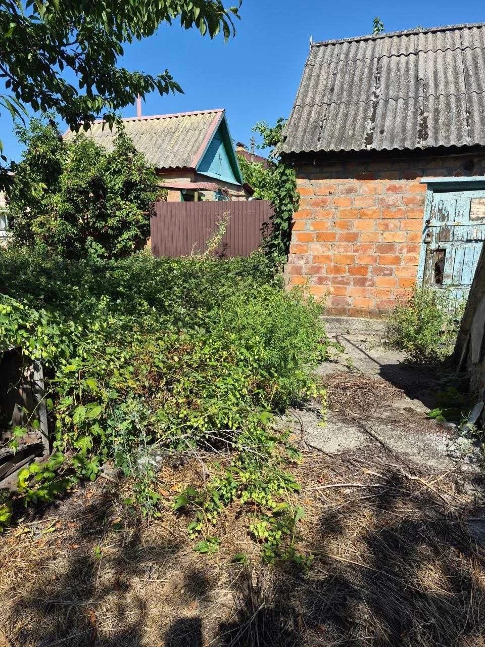 Продам 1/2 БУДИНКУ в р-ні нагірної частини. 18500