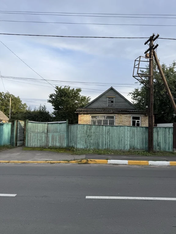 Будинок Буча з ділянкою
