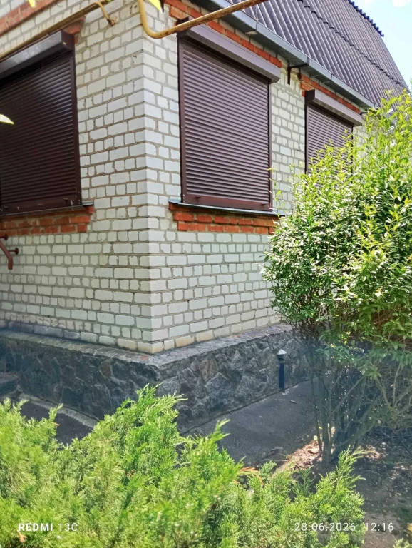 Добротный кирпичный дом в городе Люботин