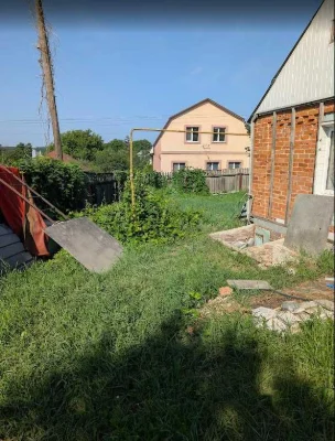 Будинок продам в Люботині під ремонт+житлова літня кухня ,га