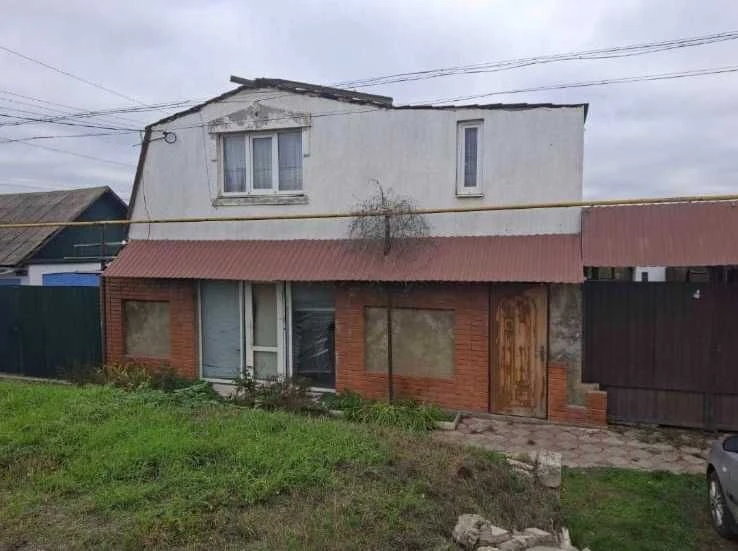 Двоповерховий будинок у центрі