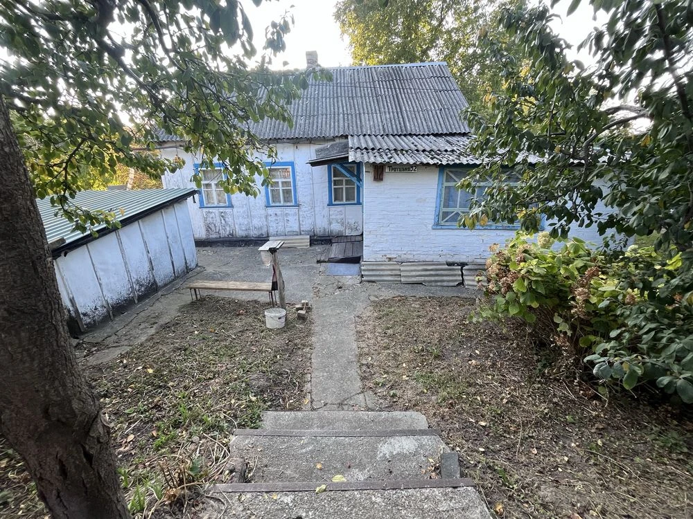 Участок з будинком