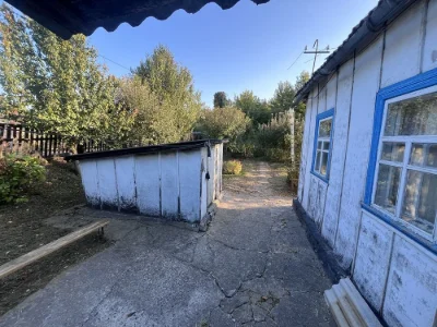 Участок з будинком