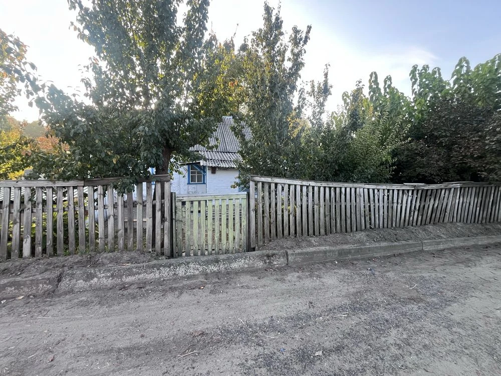 Участок з будинком