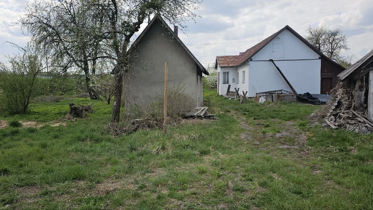будинок з ділянкою 35 сотиків