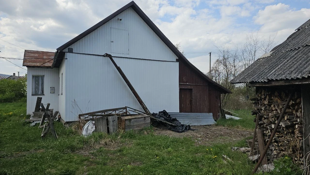 будинок з ділянкою 35 сотиків
