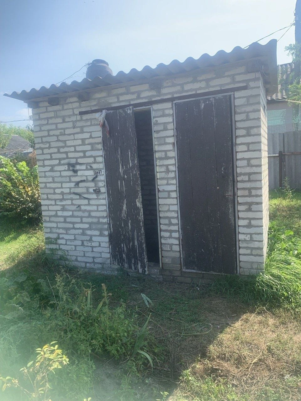 Продам 1/2 будинку поруч з центром Мерефи.