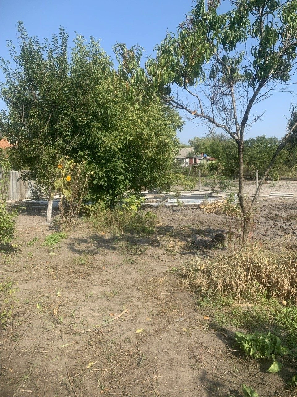 Продам 1/2 будинку поруч з центром Мерефи.