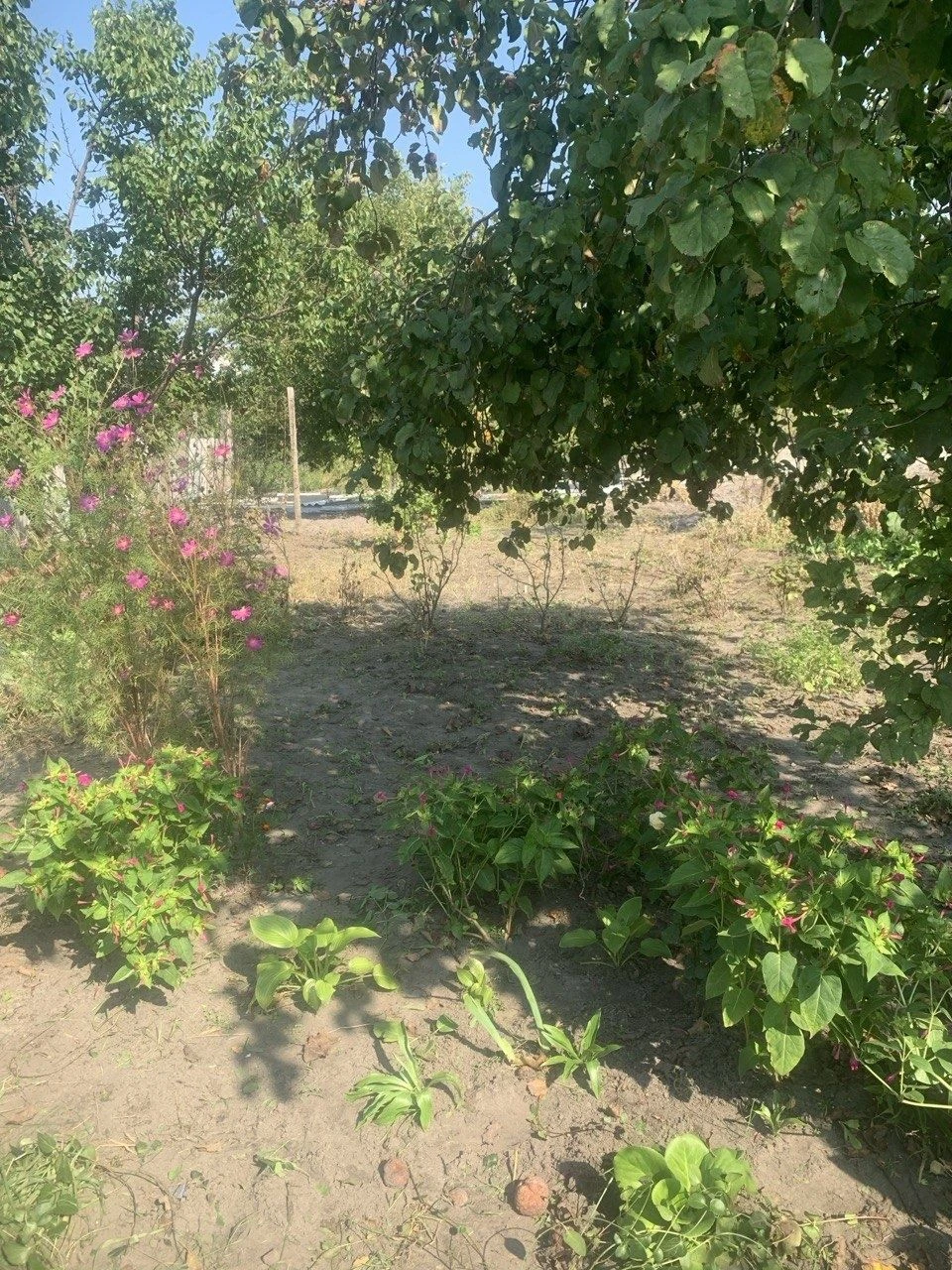 Продам 1/2 будинку поруч з центром Мерефи.
