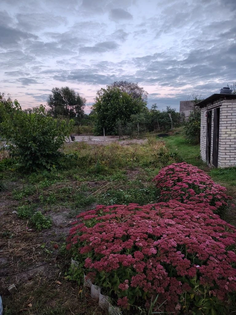 Продам 1/2 будинку поруч з центром Мерефи.