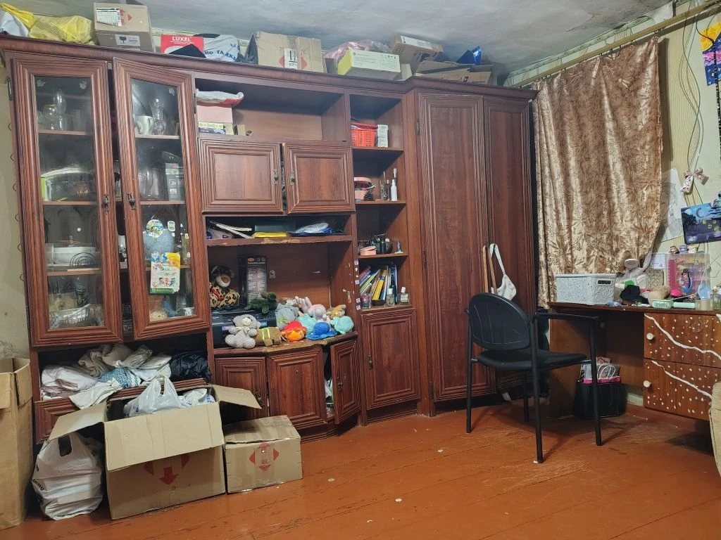 Продам 1/2 будинку поруч з центром Мерефи.