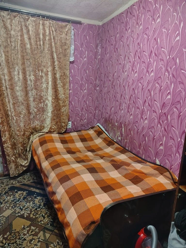 Продам 1/2 будинку поруч з центром Мерефи.