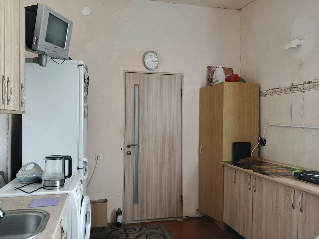 Продаю добротный кирпичный дом в самом центре г Мерефа