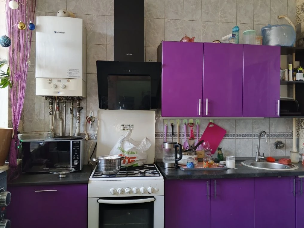 Продаю добротный кирпичный дом в самом центре г Мерефа