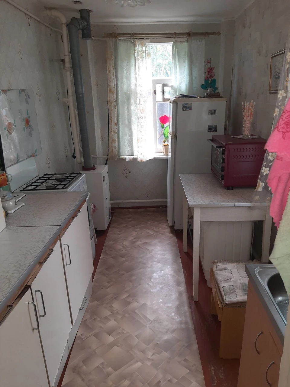 Продам 1/2дома в Мерефе