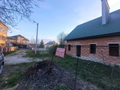 половина будинку та земельна ділянка 2,56 сот., м. Винники