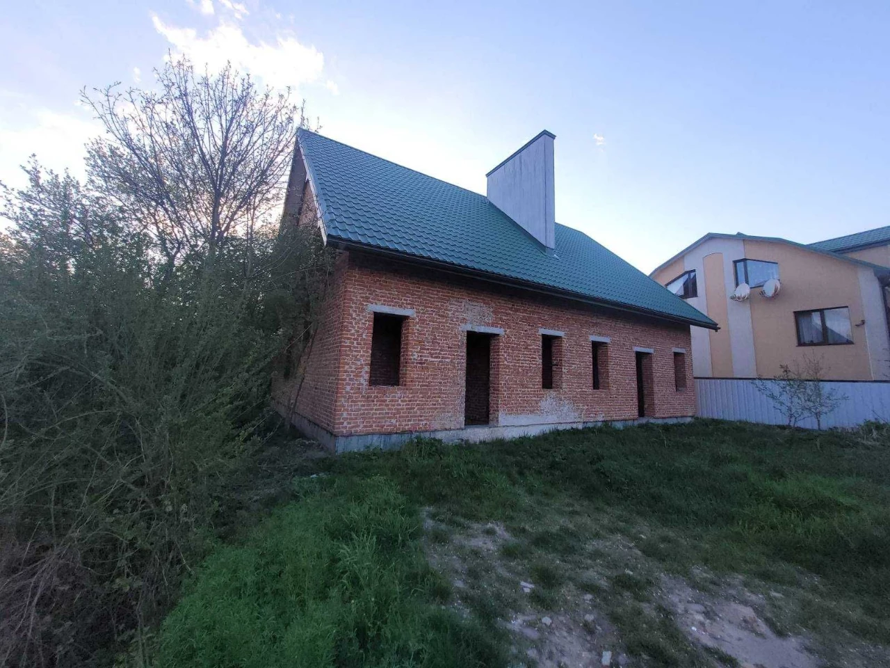 половина будинку та земельна ділянка 2,56 сот., м. Винники