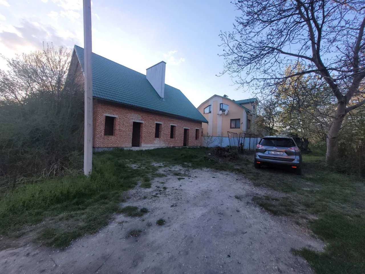 половина будинку та земельна ділянка 2,56 сот., м. Винники