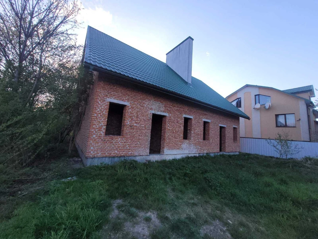 половина будинку та земельна ділянка 2,56 сот., м. Винники