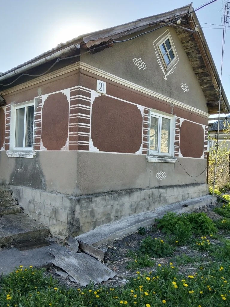 Будинок та присадибна ділянка