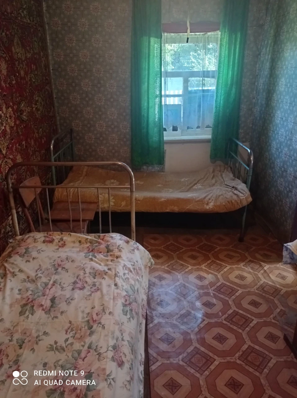Земельна ділянка з будинком та прибудовами