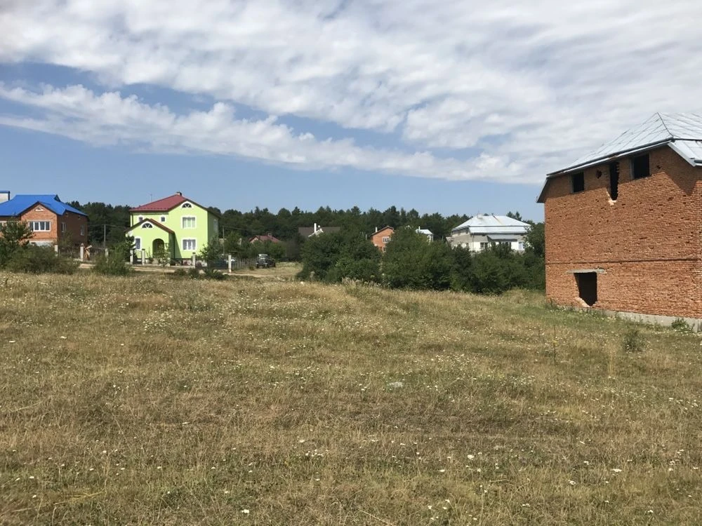 Незакінчений будинок + земельна ділянка