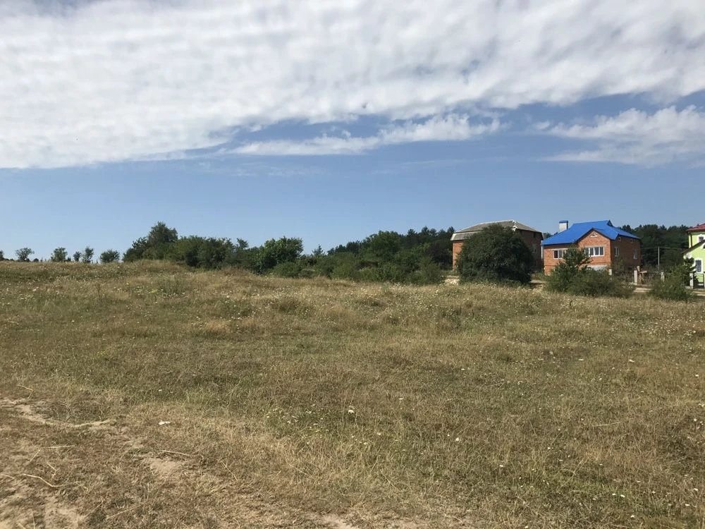 Незакінчений будинок + земельна ділянка