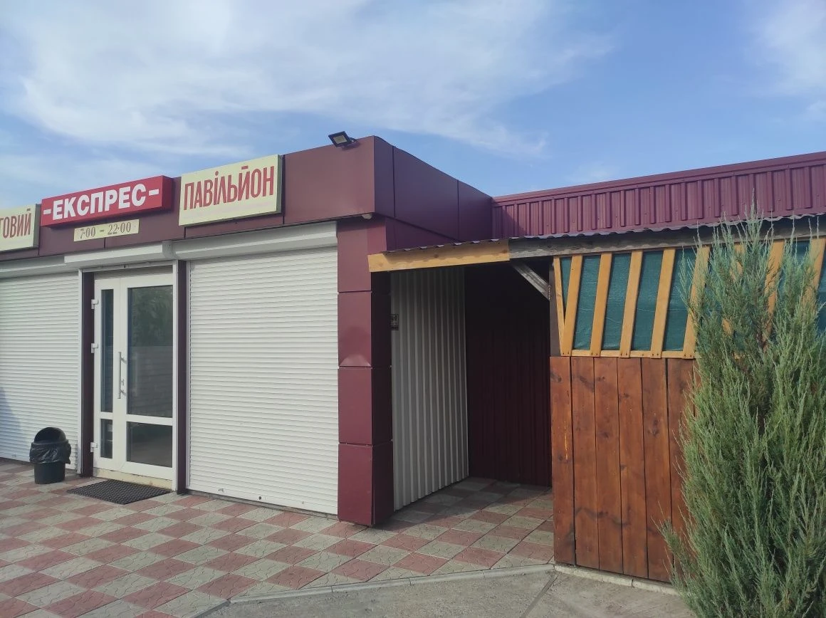 Продам земельный участок , и действующий  магазин.