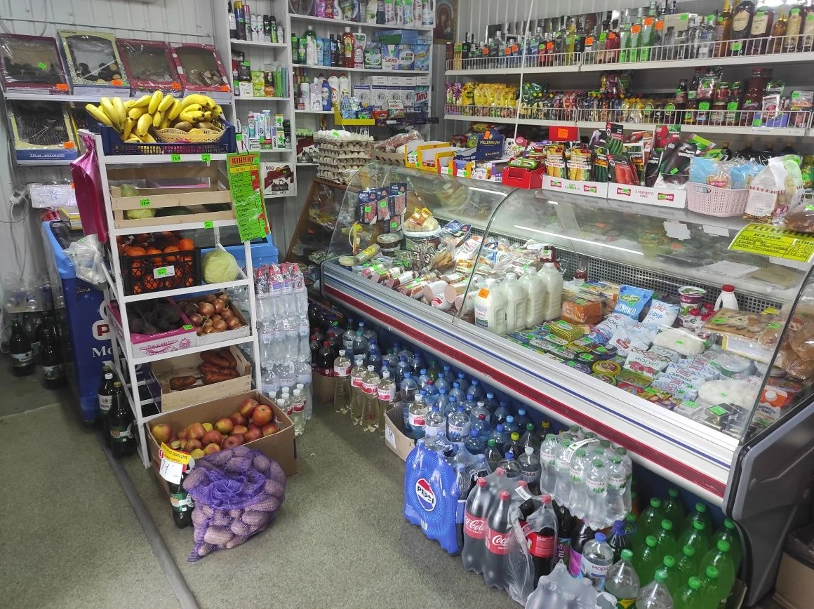 Продам земельный участок , и действующий  магазин.