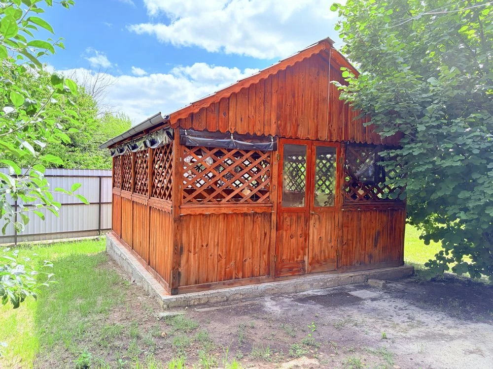 Земельна дачна ділянка 18 соток з альтанками та будиночком |