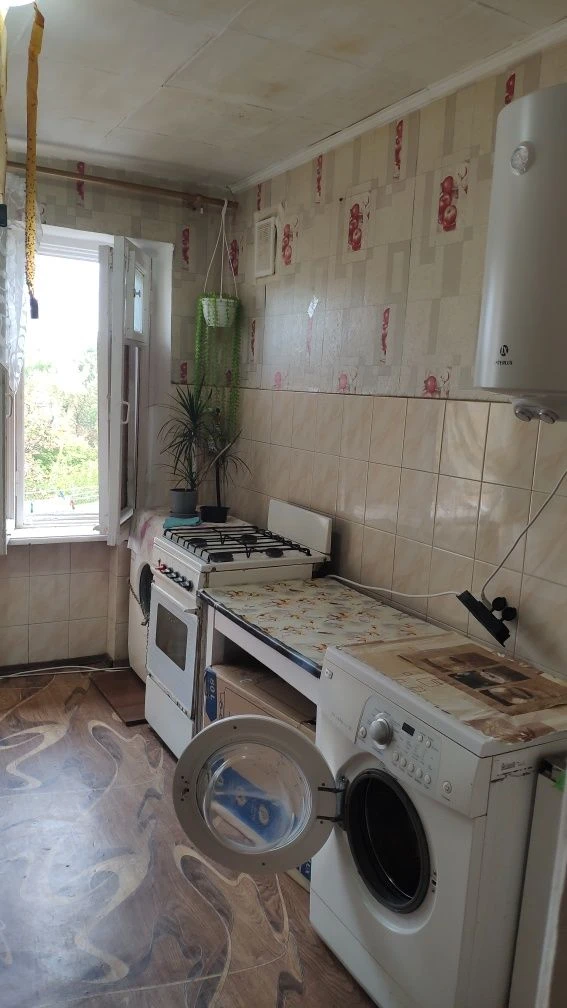 Продам кімнату в комунальній квартирі по вул.Празька