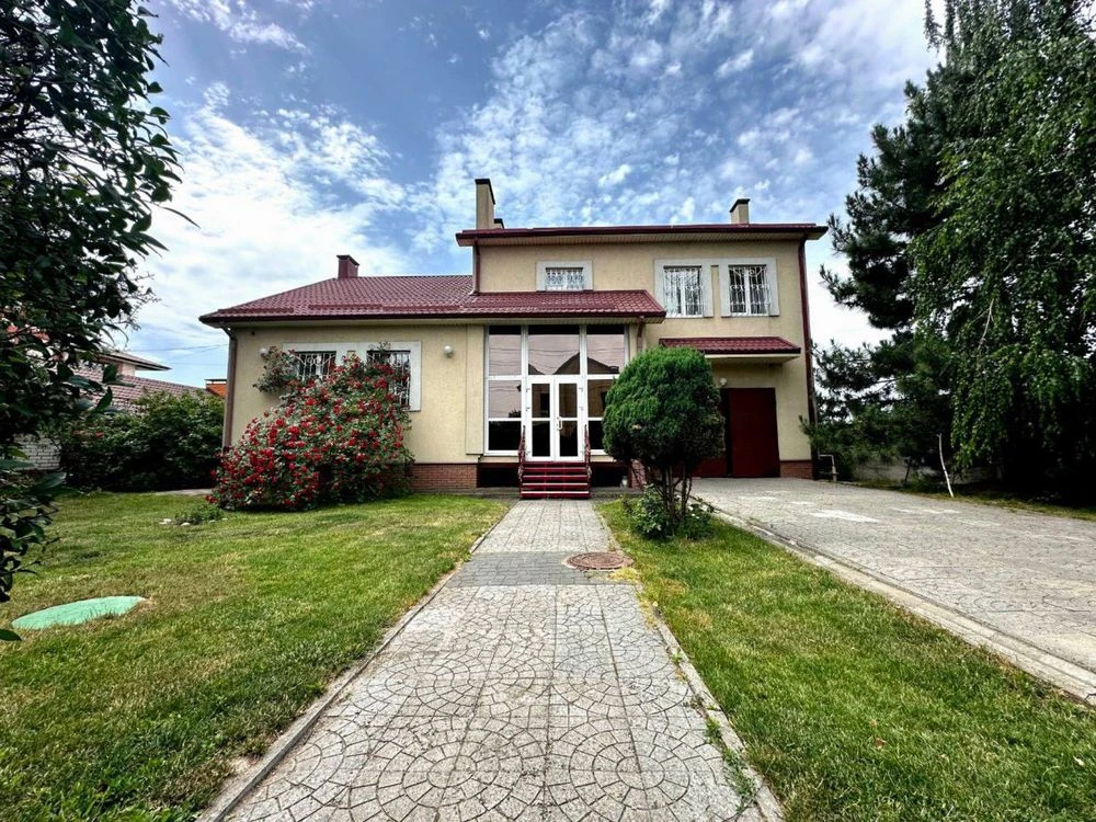 продам 2 -х этажный дом 200 квм  с укрытием в Подгородном