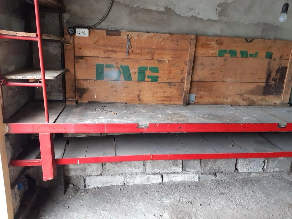 продам капитальный гараж в районе Крытого рынка.