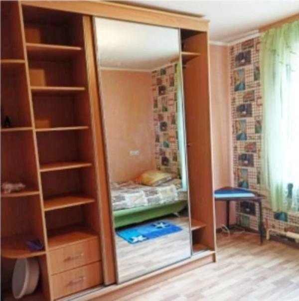 Продається кімната в цегляному будинку в районі Одеської.