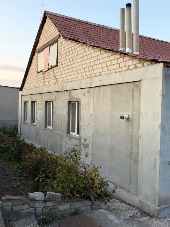 For sale: House with land and farm buildings
