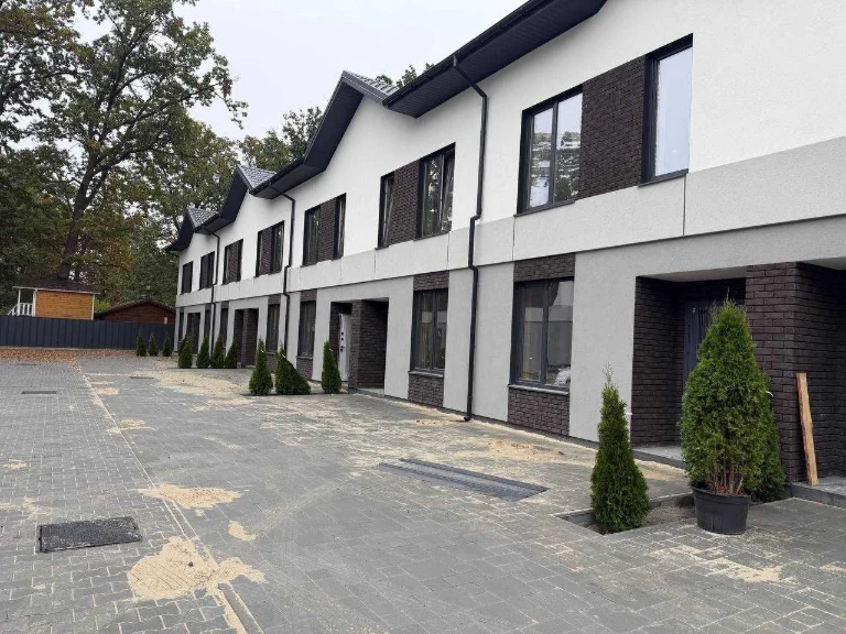 For Sale: Two-Story Townhouse with Individual Gas Heating